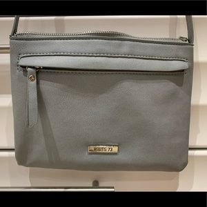 Roots cross body purse